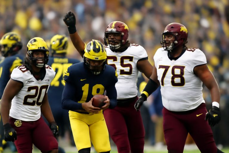 minnesota vence michigan pela capa: retrata o jogaço de futebol americano universitário